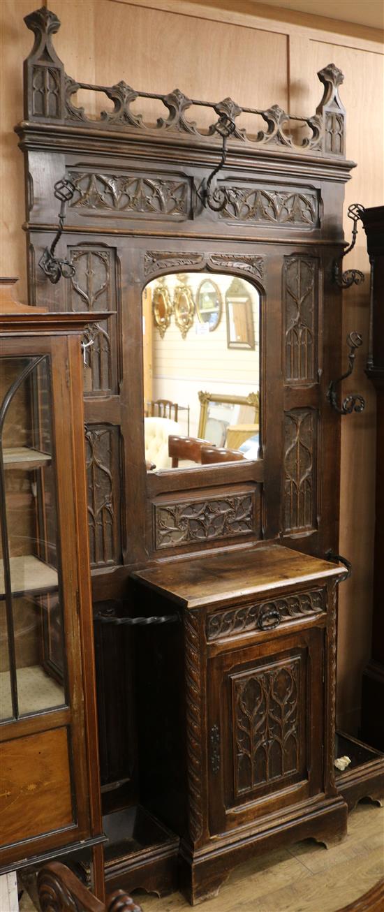 An early 20th century Gothic style oak hallstand W.110cm